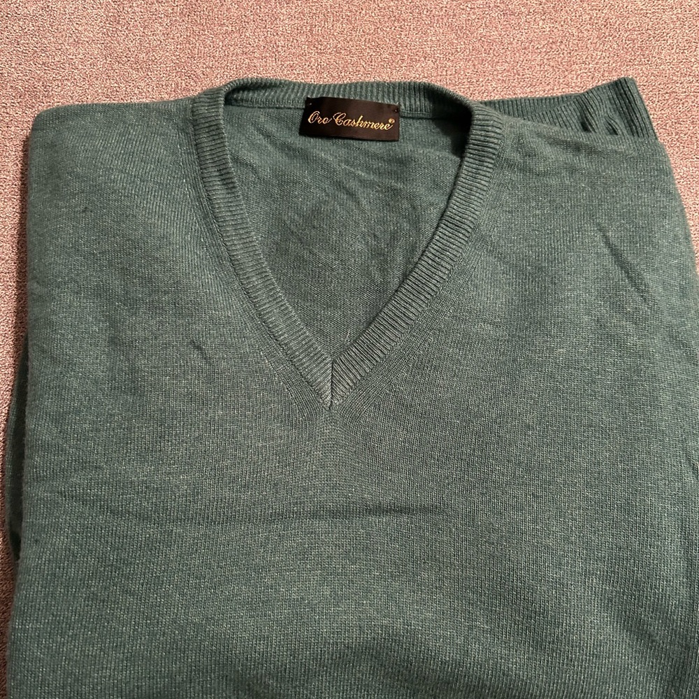 Men’s cashmere v-neck sweater, size medium, color heather green.